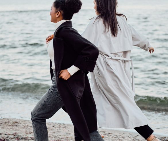 two-attractive-stylish-girls-in-trench-coats-happi-S8SUAFT.jpg